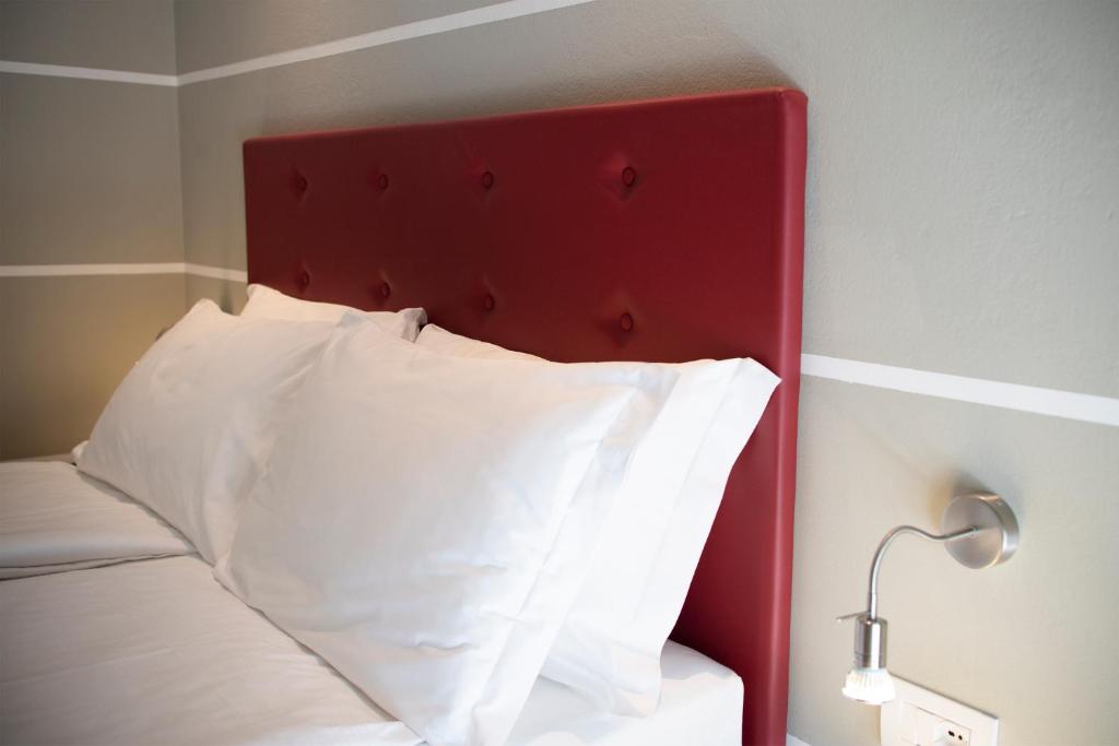 Postel nebo postele na pokoji v ubytování Hotel Imperial ***S
