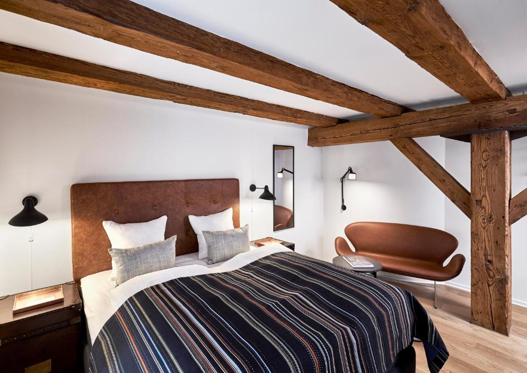 Una cama o camas en una habitación de 71 Nyhavn Hotel
