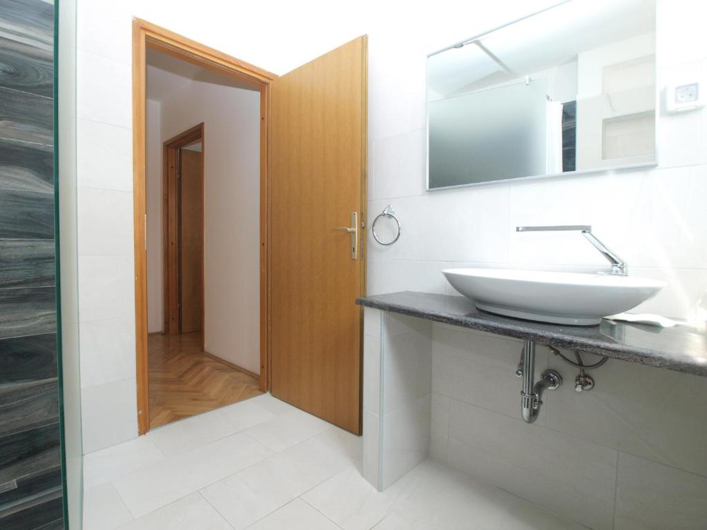 Kuchyň nebo kuchyňský kout v ubytování Apartments and rooms Novigrad 1624