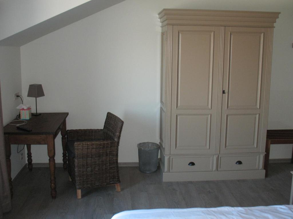 Posezení v ubytování B&B La Vie En Roses