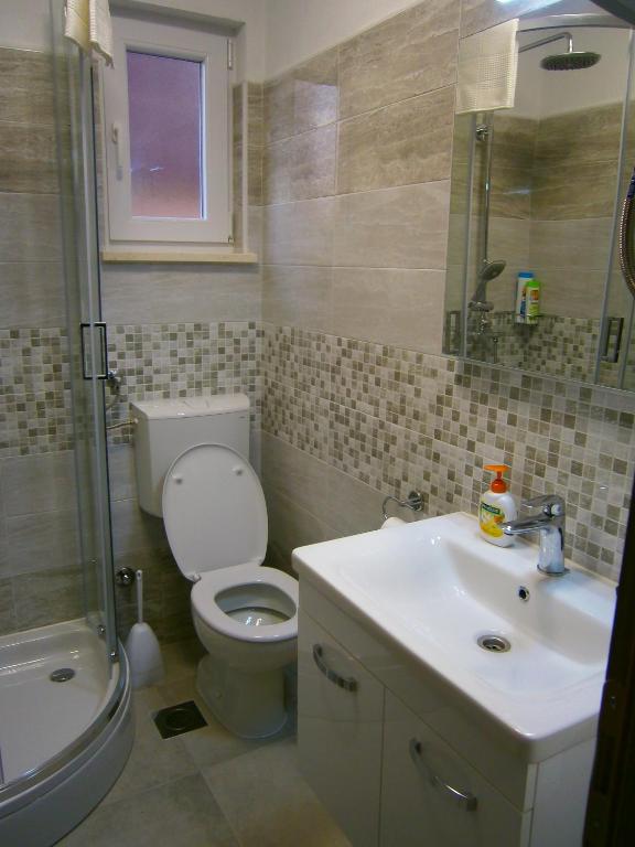 Koupelna v ubytování Studio apartment Luzia