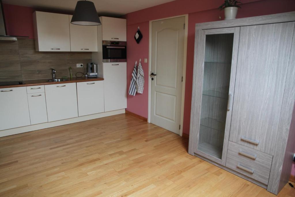 Kuchyň nebo kuchyňský kout v ubytování Appartement Courcelles