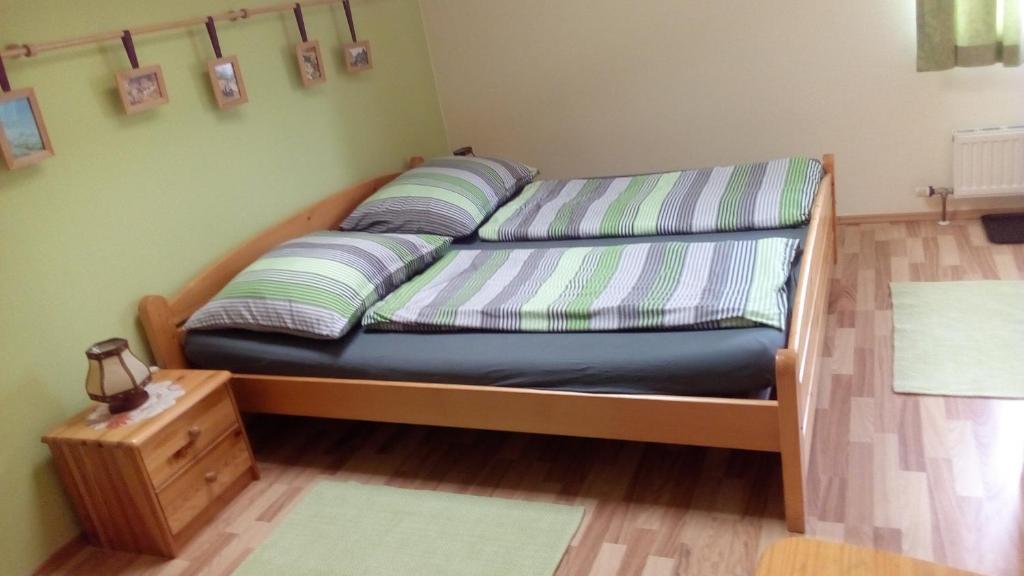 Postel nebo postele na pokoji v ubytování Gästezimmer Klopfer