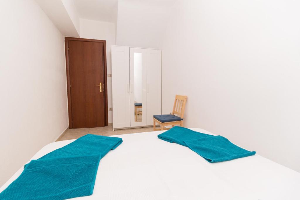 Postel nebo postele na pokoji v ubytování Alexger Psakoudia Seaview House