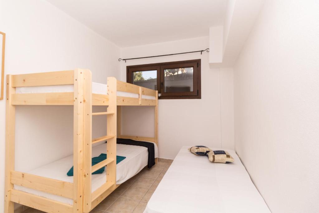 Postel nebo postele na pokoji v ubytování Alexger Psakoudia Seaview House