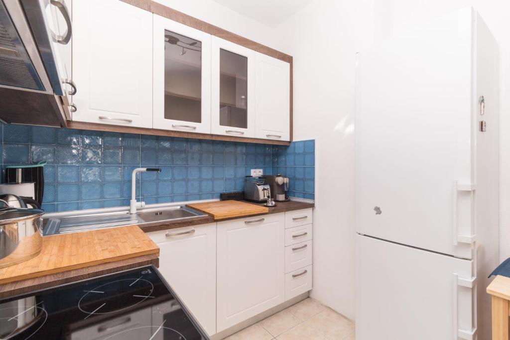 Kuchyň nebo kuchyňský kout v ubytování Alexger Psakoudia Seaview House