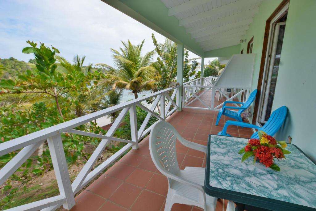 Balkón nebo terasa v ubytování Cabier Ocean Lodge