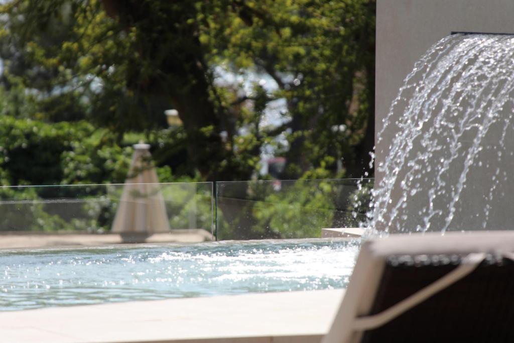Bazén v ubytování Hotel Son Caliu Spa Oasis nebo v jeho okolí