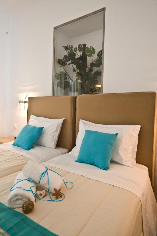 Postel nebo postele na pokoji v ubytování Zannis Hotel