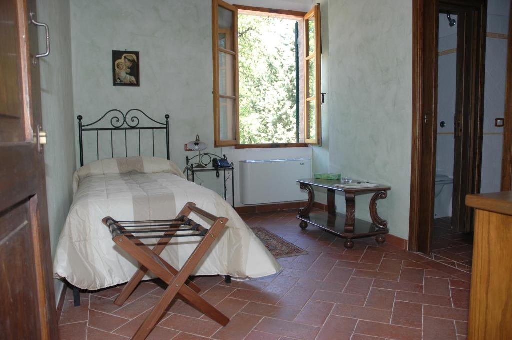 Posteľ alebo postele v izbe v ubytovaní Piccolo Hotel San Valentino