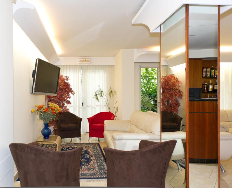 TV a/nebo společenská místnost v ubytování Hotel St Pierre