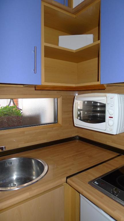Kuchyň nebo kuchyňský kout v ubytování Mini Apartamento Port Aiguadolç