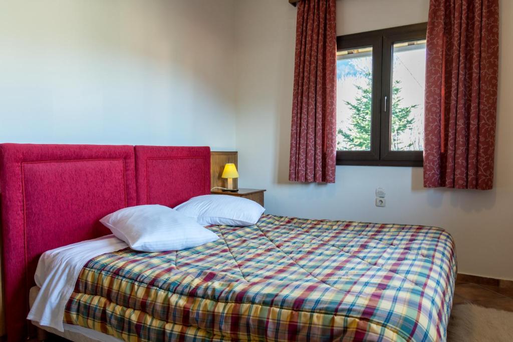 Posteľ alebo postele v izbe v ubytovaní Mountain House
