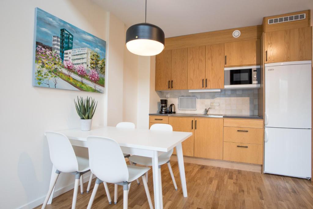 Kuchyň nebo kuchyňský kout v ubytování ApartDirect Hammarby Sjöstad