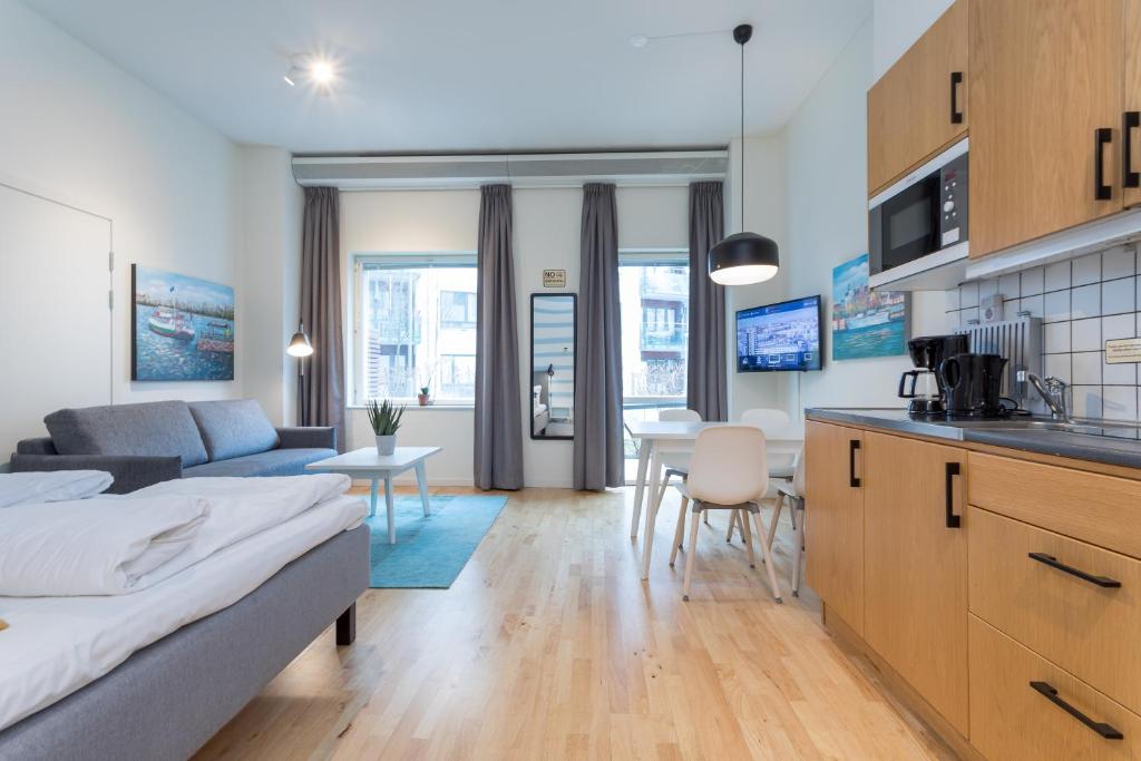 Kuchyň nebo kuchyňský kout v ubytování ApartDirect Hammarby Sjöstad