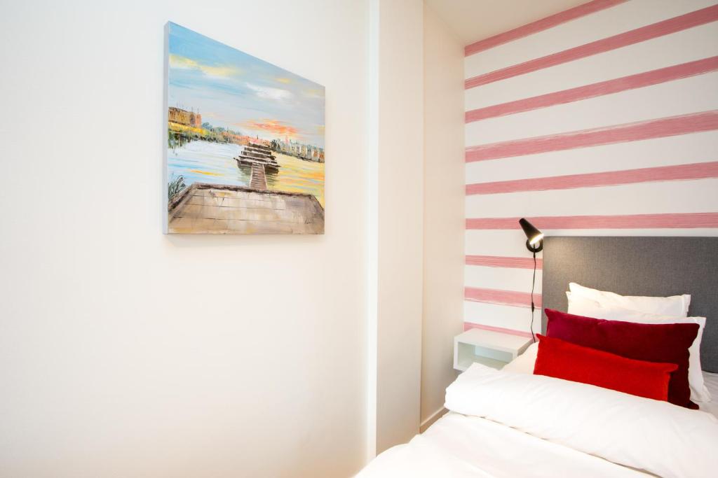 Postel nebo postele na pokoji v ubytování ApartDirect Hammarby Sjöstad