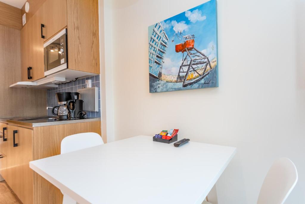 Kuchyň nebo kuchyňský kout v ubytování ApartDirect Hammarby Sjöstad