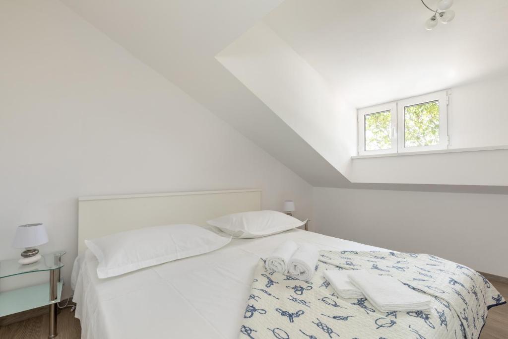 Posteľ alebo postele v izbe v ubytovaní Apartmant Centar Split