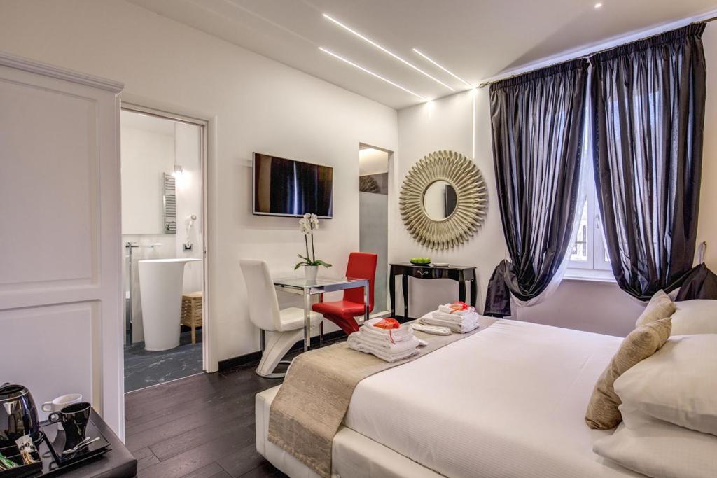 Кровать или кровати в номере Navona Living Rome