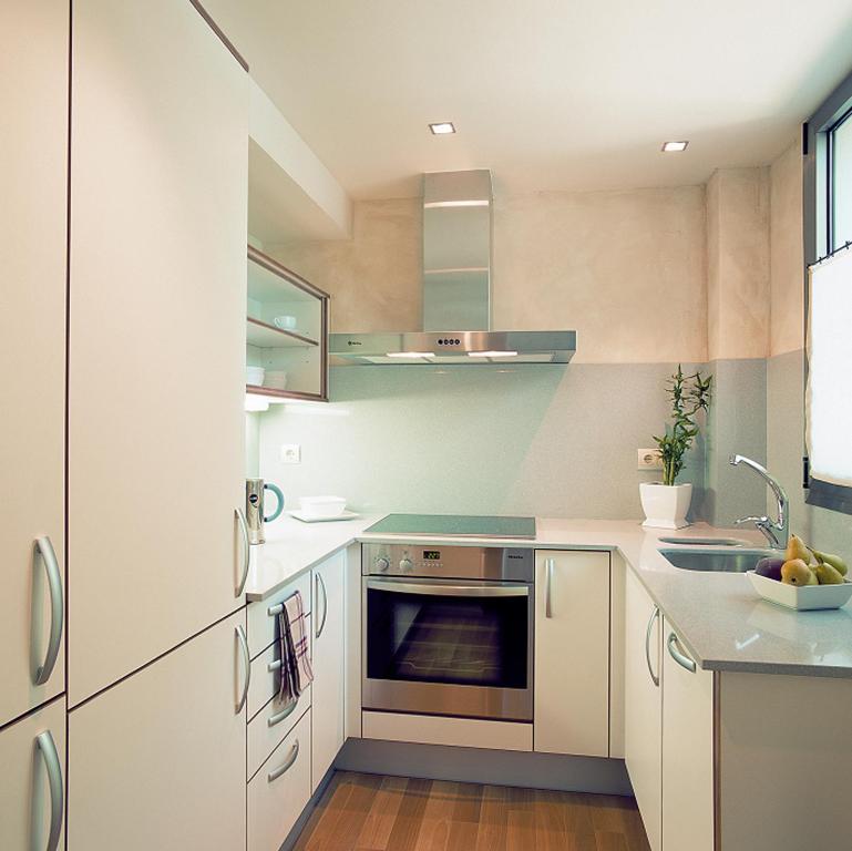 Kuchyň nebo kuchyňský kout v ubytování Apartaments Boutique la Torreta del Llac