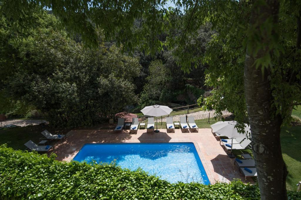 Bazén v ubytování Hotel Convent de Begur nebo v jeho okolí