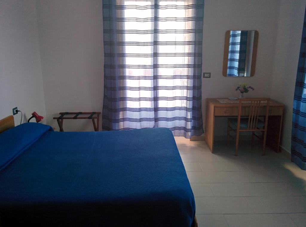 Postel nebo postele na pokoji v ubytování Albergo Villa Verde