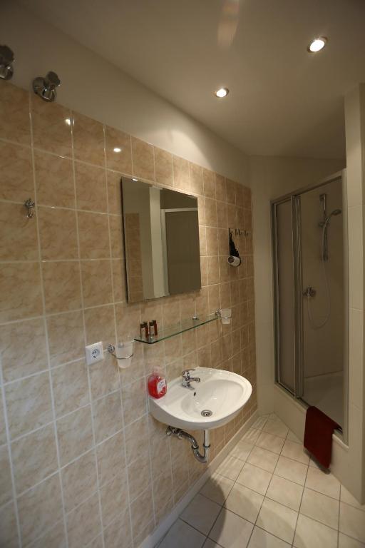 Koupelna v ubytování Hotel AI Königshof