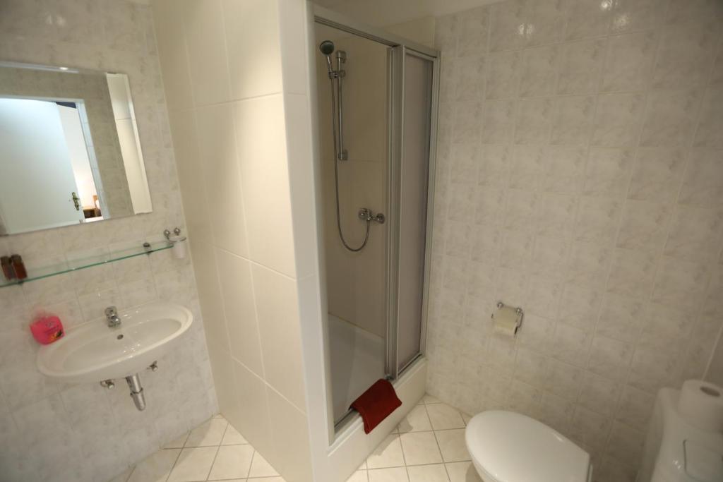 Koupelna v ubytování Hotel AI Königshof