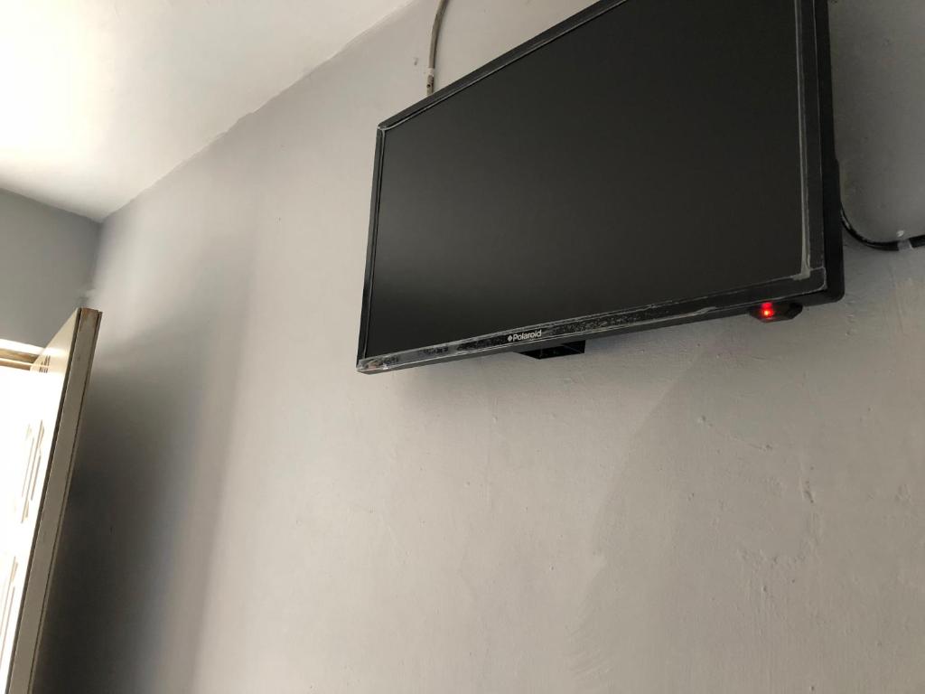TV a/nebo společenská místnost v ubytování Hotel San Juan