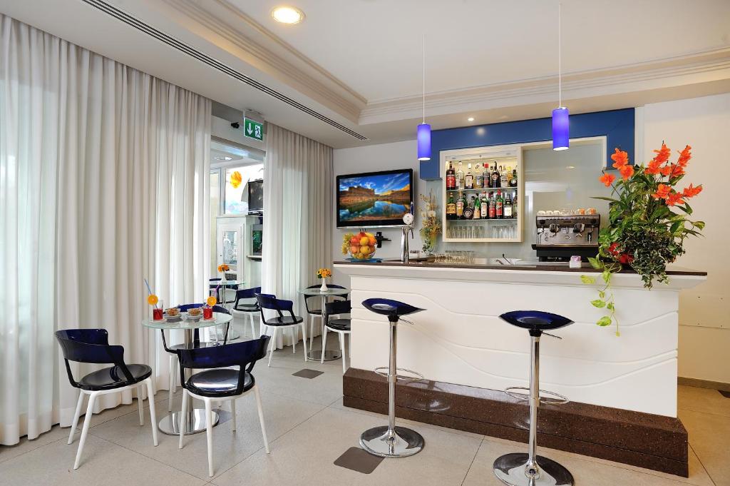Nápoje v ubytování Hotel Amedeo