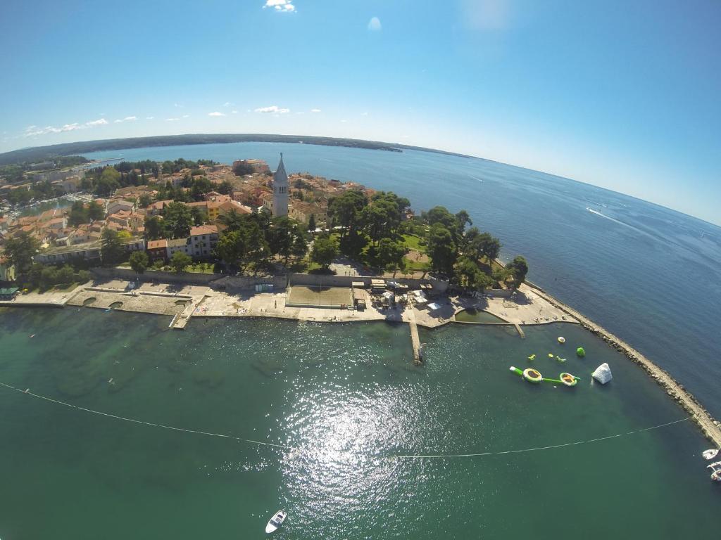 an island in the middle of a body of water at apartma Jelka in Novigrad Istria