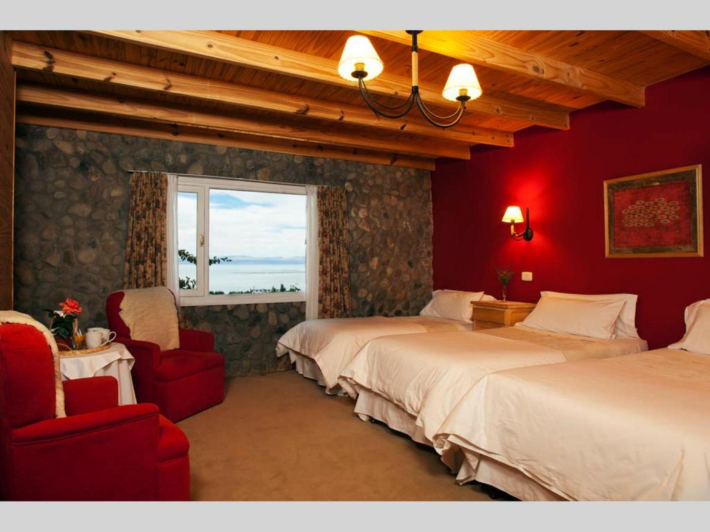 Cama ou camas em um quarto em Blanca Patagonia Hostería Boutique y Cabañas