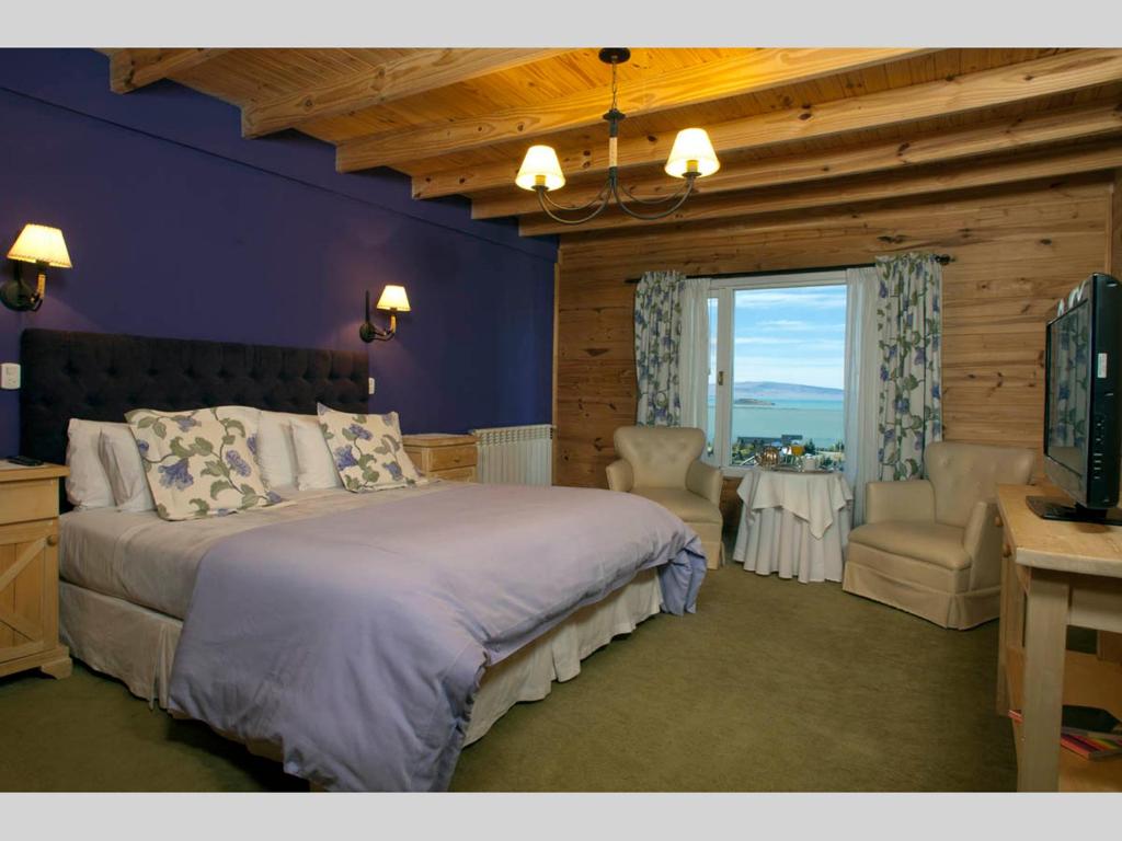 Cama ou camas em um quarto em Blanca Patagonia Hostería Boutique y Cabañas