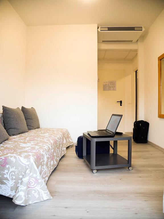 Postel nebo postele na pokoji v ubytování Infinity