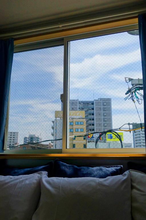 Posezení v ubytování Fukuoka Tabiji Hostel & Guesthouse
