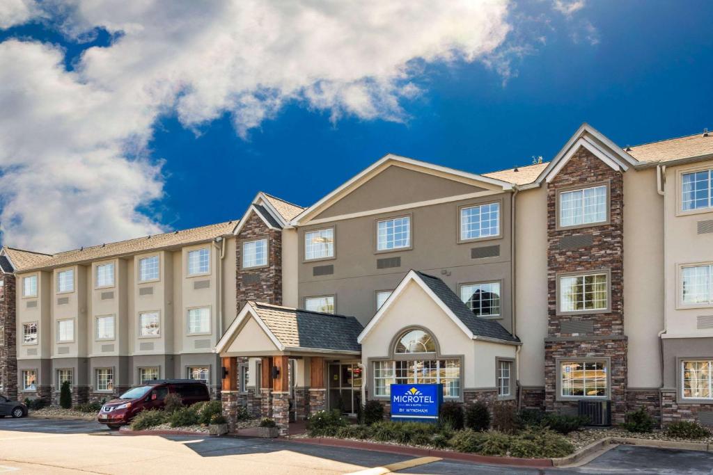 a rendering of the front of a building at Microtel Inn & Suites - Greenville in Greenville