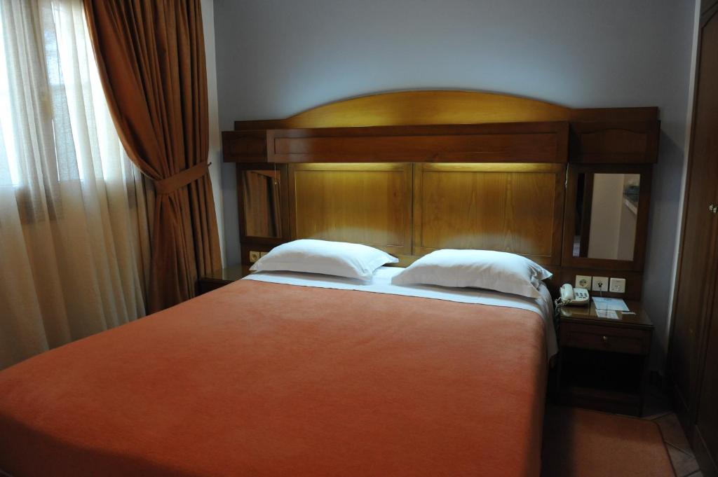 Posteľ alebo postele v izbe v ubytovaní Hotel Katerina
