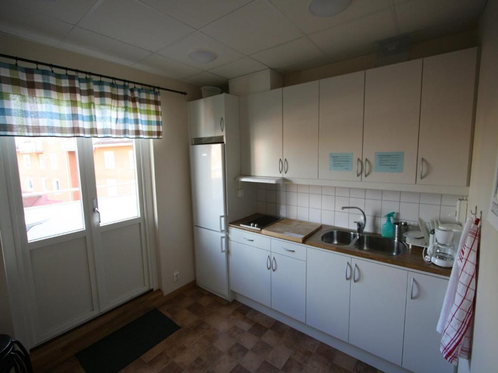 Kuchyň nebo kuchyňský kout v ubytování Hotell Linnéa