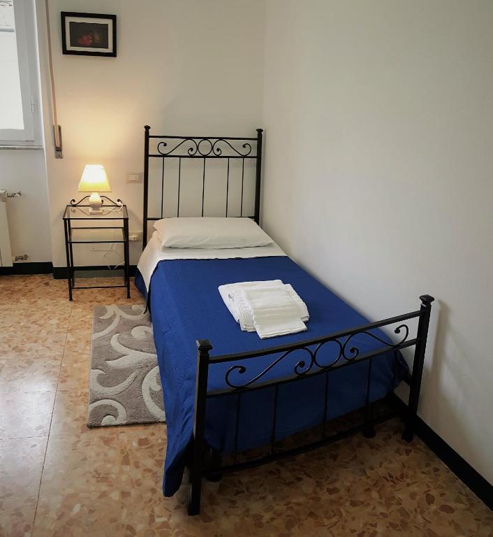 Postel nebo postele na pokoji v ubytování Le Midi Versilia