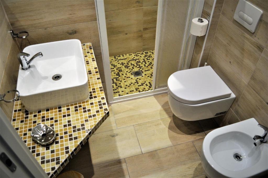 Koupelna v ubytování Hotel Corallo Garnì