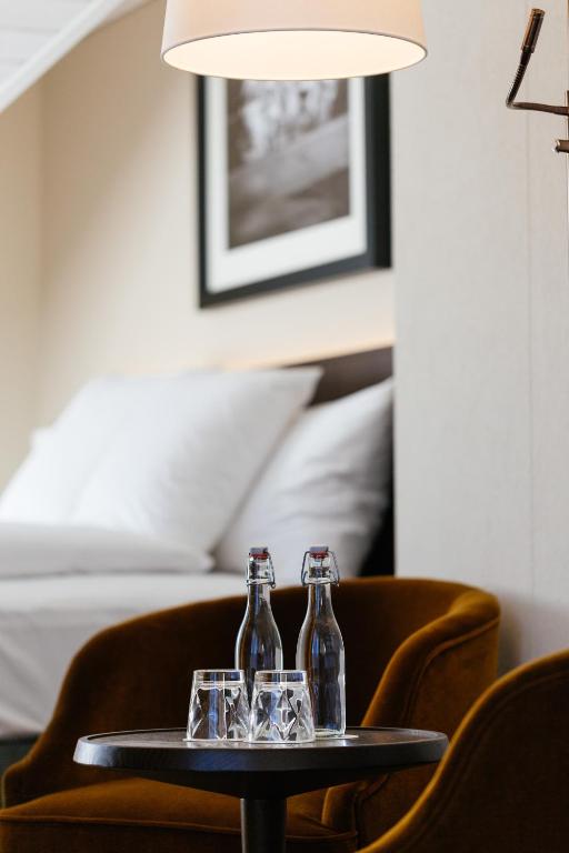 Postel nebo postele na pokoji v ubytování Hotel Taverna
