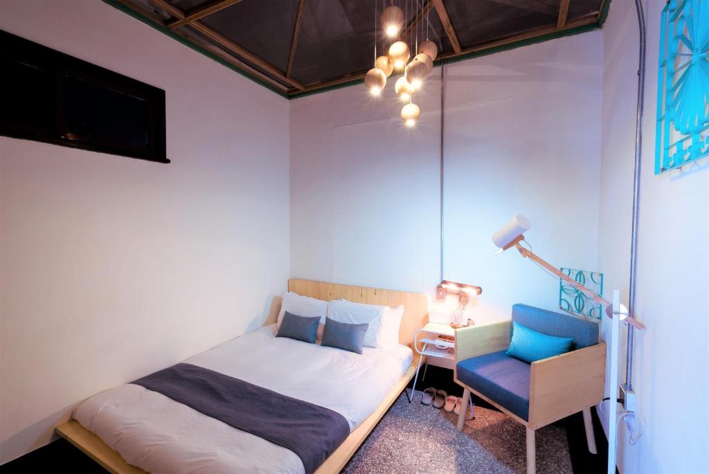 Postel nebo postele na pokoji v ubytování With Inn Hostel