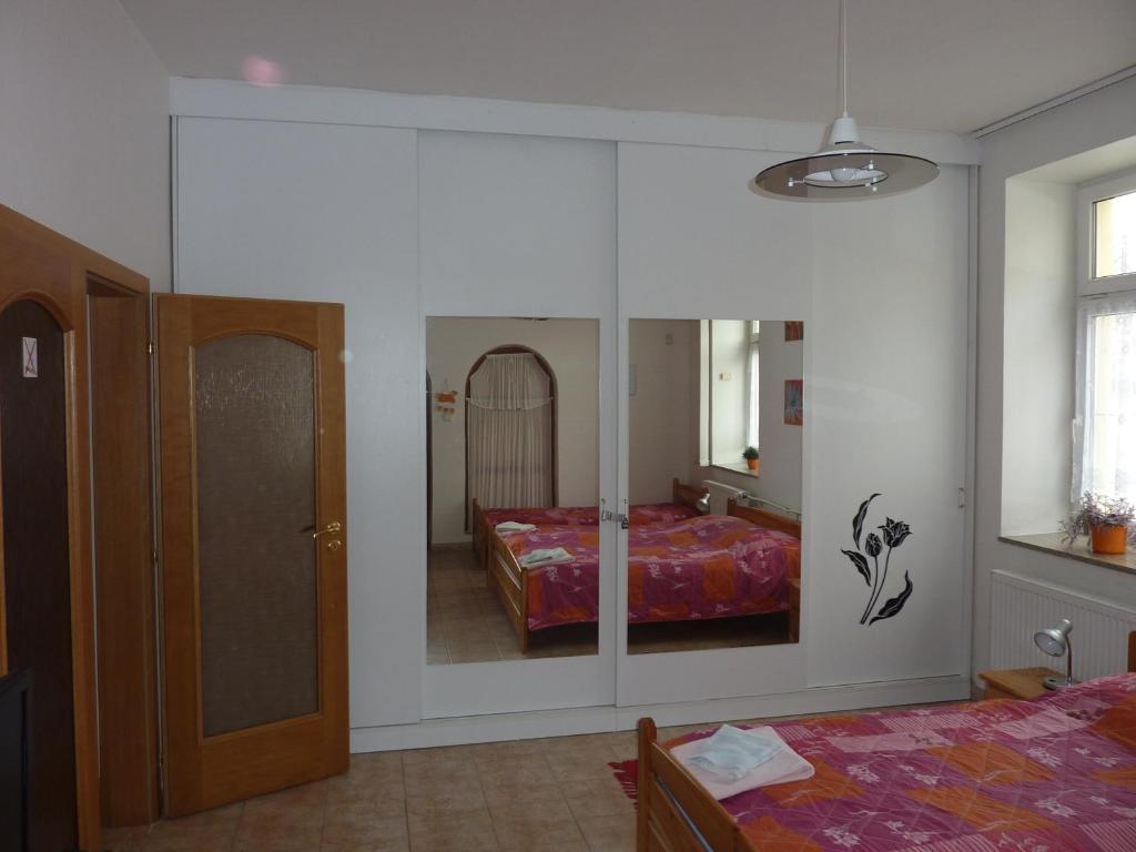 Postel nebo postele na pokoji v ubytování Apartmany u Dvora