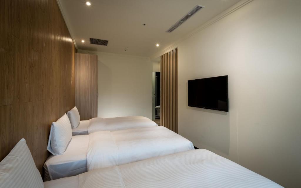 TV a/nebo společenská místnost v ubytování Merryday Hotel Banqiao