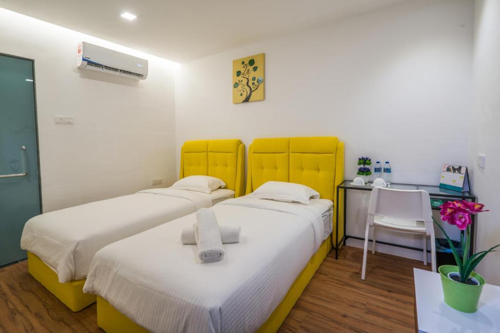 Postel nebo postele na pokoji v ubytování My Sj Hotel