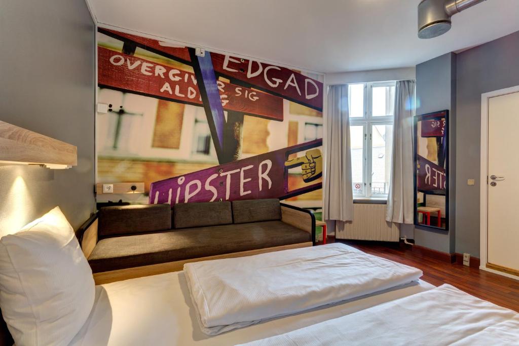 Postel nebo postele na pokoji v ubytování Urban House Copenhagen by MEININGER