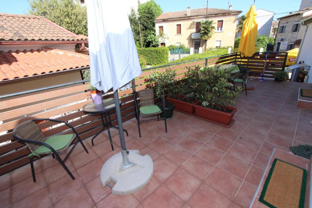 Balkon lub taras w obiekcie Apartments Sorriso