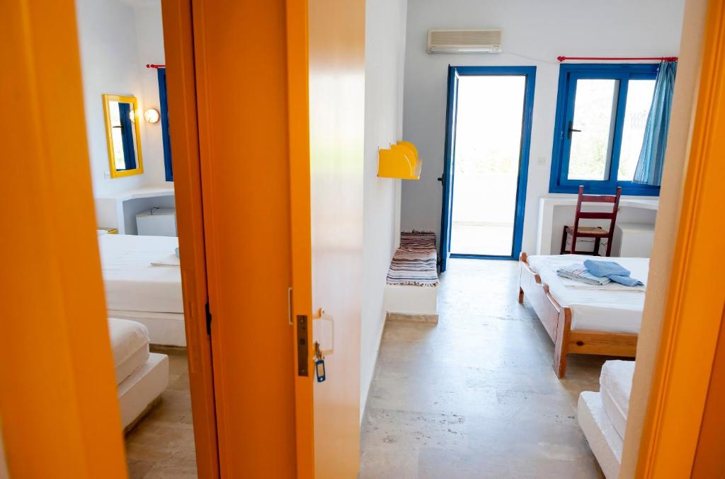 Posteľ alebo postele v izbe v ubytovaní Plakias Bay Hotel