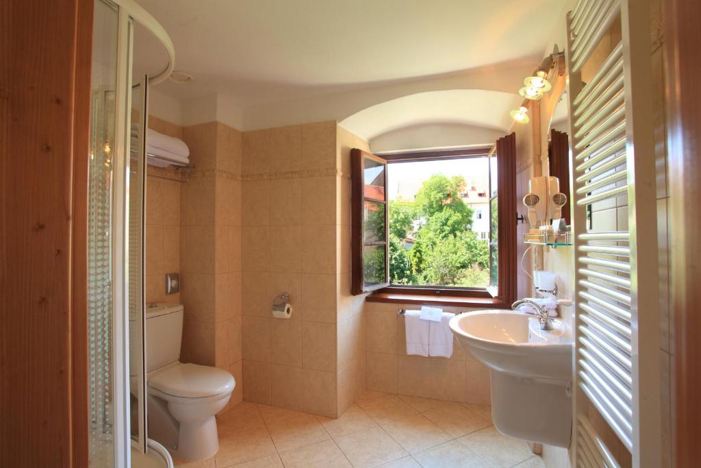 Koupelna v ubytování Questenberg Hotel