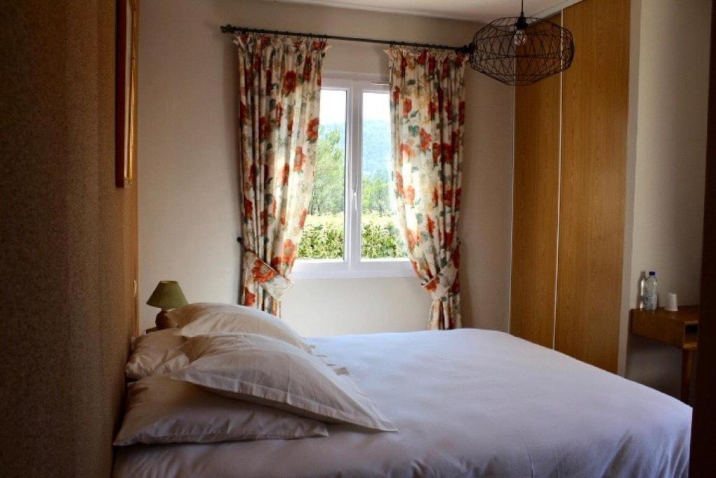 Postel nebo postele na pokoji v ubytování Bastide Saint Bernard